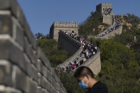 China authorities arrest 2 for smashing shortcut through Great Wall with excavator