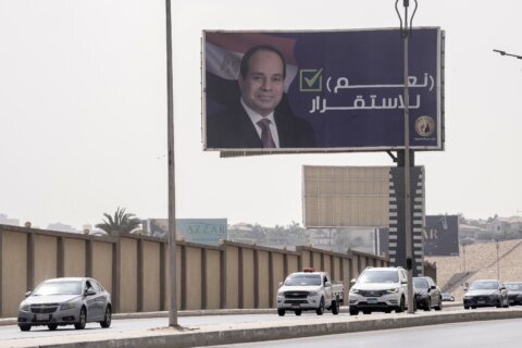 Egypt sets a presidential election for December with el-Sissi likely to stay in power until 2030