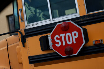 Medium shot of a stop sign on a school bus