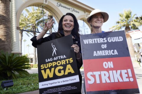 An end in sight? Striking writers and Hollywood studios spend second full day in negotiations