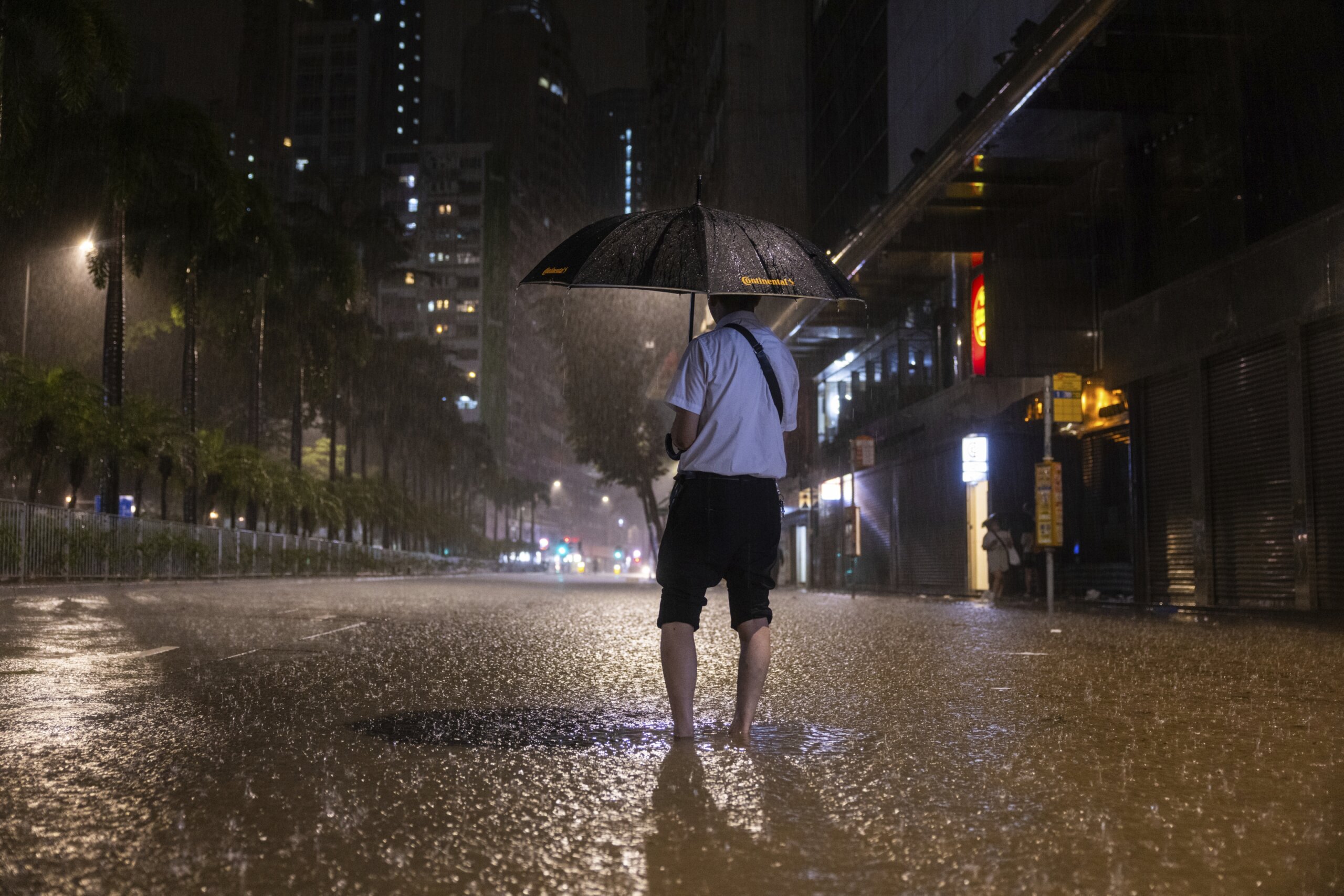 2 dead in Hong Kong amid extreme rain and flash floods that also struck ...