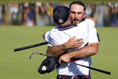 After 28 hours, the U.S. finally wins a full point at the Ryder Cup with rookies Homa and Harman