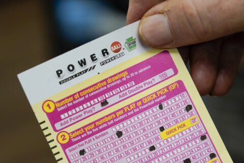 Powerball jackpot rises to $925 million after another drawing without a big winner