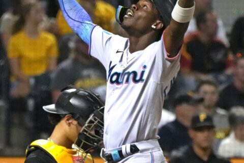 Chisholm homers and the surprising Miami Marlins grab an NL wild-card spot with 7-3 win over Pirates