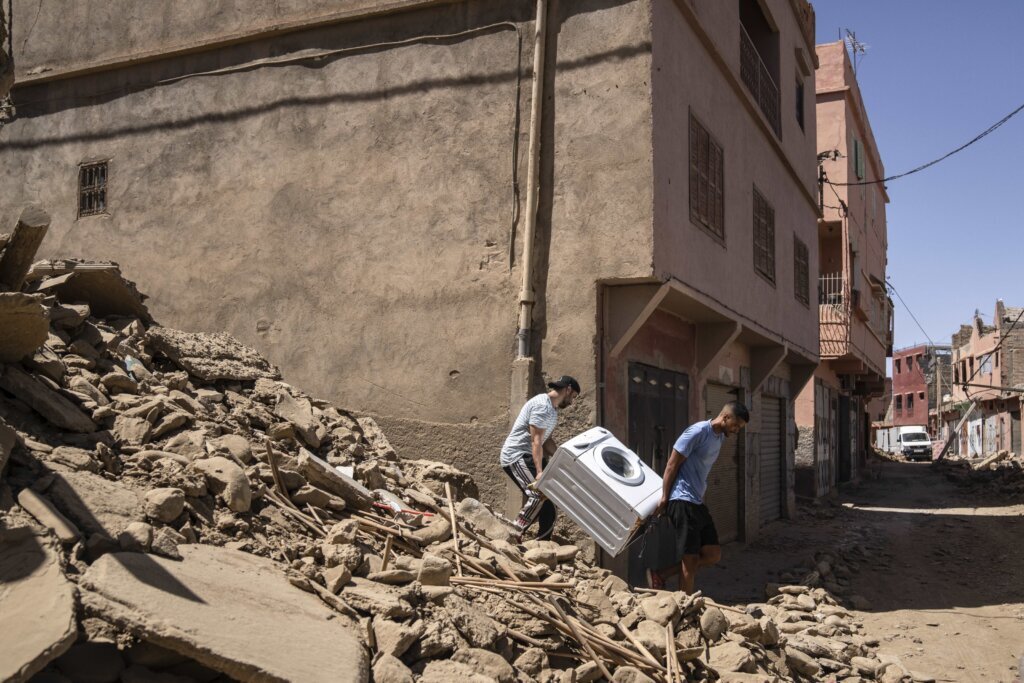 Moroccans with shovels and bulldozers dig through rubble but hope for survivors dwindles after quake