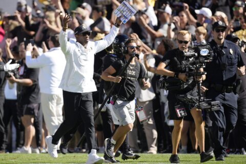 Shedeur Sanders, No. 22 Colorado beat Nebraska 36-14 in sold out home debut for Deion Sanders