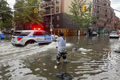 New York stunned and swamped by record-breaking rainfall as more downpours are expected