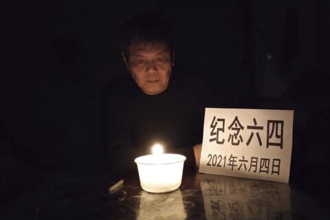 A Chinese dissident in transit at a Taiwan airport pleads for help in seeking asylum