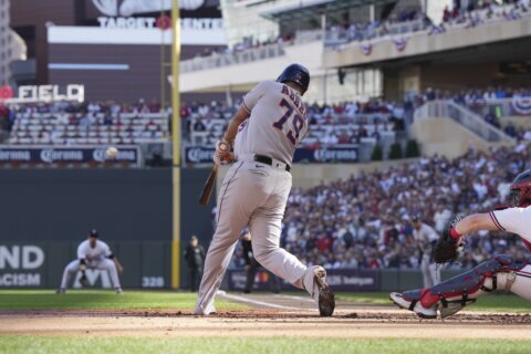 Astros pound 4 homers, with a pair by Abreu, to rout Twins 9-1 and take 2-1 ALDS lead