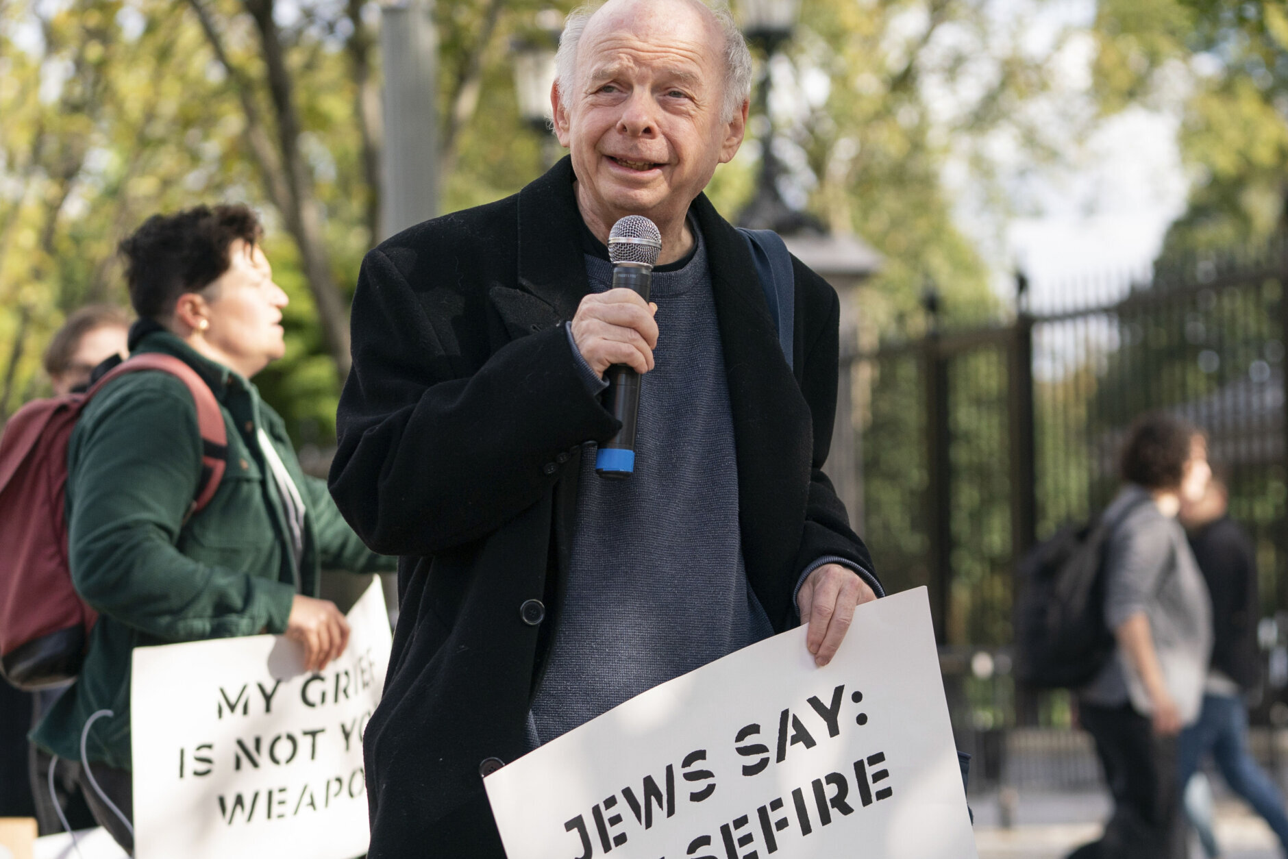 Actor Wallace Shawn speaks during a protest advocating for a ceasefire in Gaza outside the White House in Washington, Monday, Oct. 16, 2023. (AP Photo/Nathan Howard)