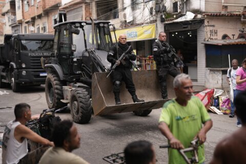Rio de Janeiro's security forces launch raids in 3 favelas to target criminals