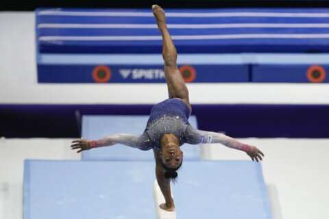 Simone Biles leads U.S. women to seventh consecutive team title at gymnastics world championships