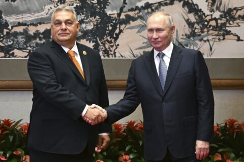 Putin meets with Hungary’s prime minister in rare in-person talks with an EU leader