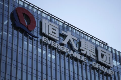China Evergrande soars after property developer’s stocks resume trading