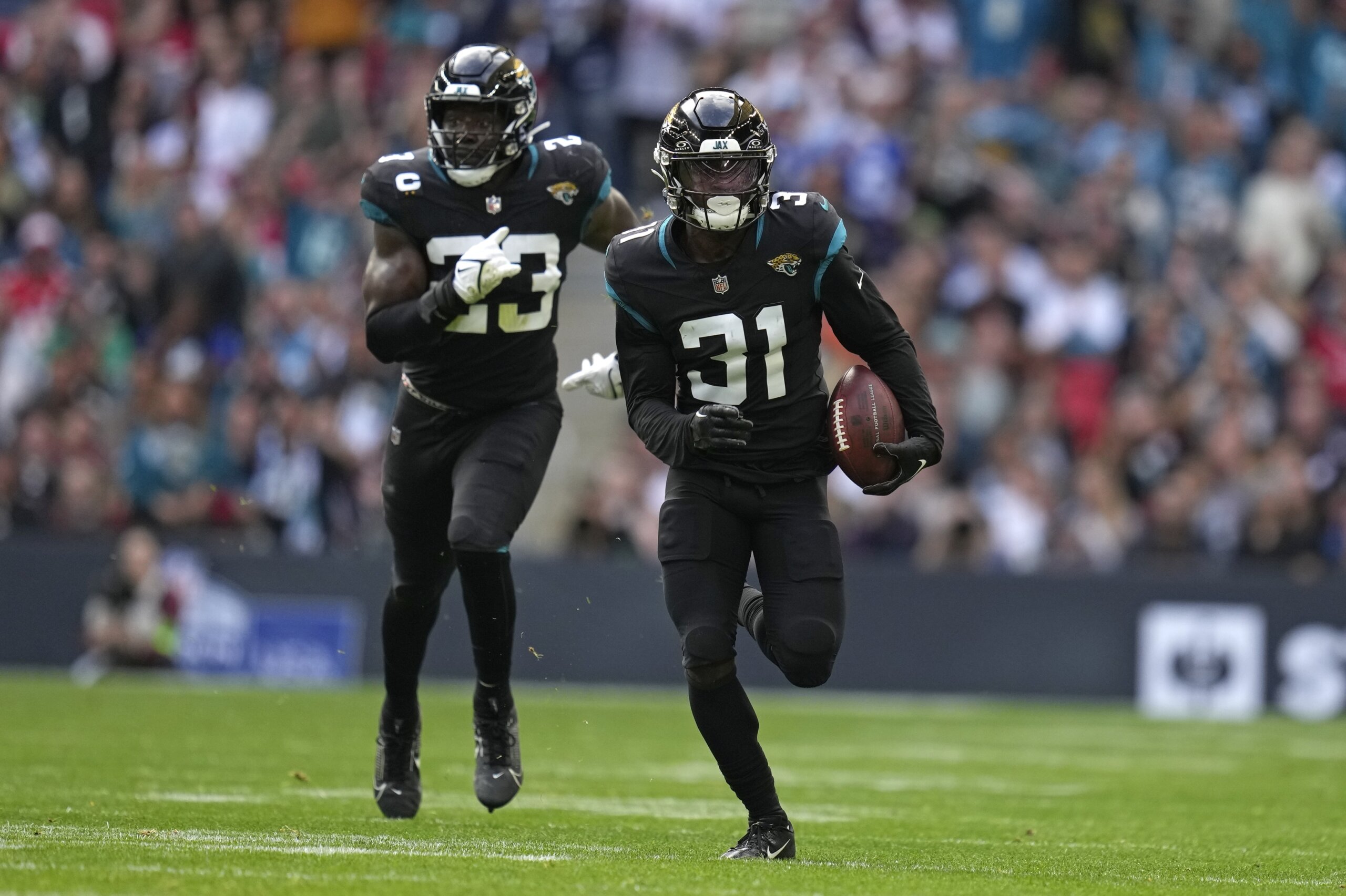 Lawrence, Ridley and defense help Jaguars beat Falcons 23-7 in London -  WTOP News