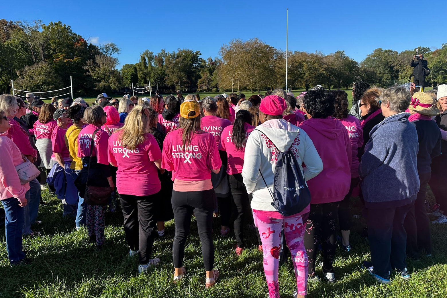 Teams of walkers, including breast cancer survivors, warriors and supporters turned out Sunday for the Walk to Bust Cancer. (WTOP/Cheyenne Corin)