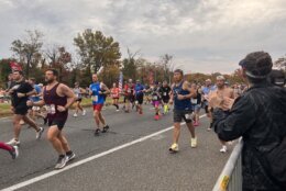 Runners take part in the 48th annual Marine Corps Marathon on Sunday.