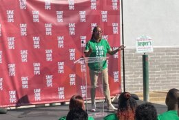 Those against a minimum wage increase for tipped workers in Prince George's County hold a rally on Thursday, wearing green in solidarity.