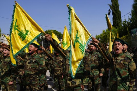 Hezbollah and Israel exchange fire and warnings of a widened war