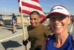 Marine carry a flag and runner
