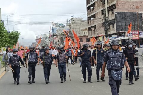 A Nepal town imposes a lockdown and beefs up security to prevent clashes between Hindus and Muslims