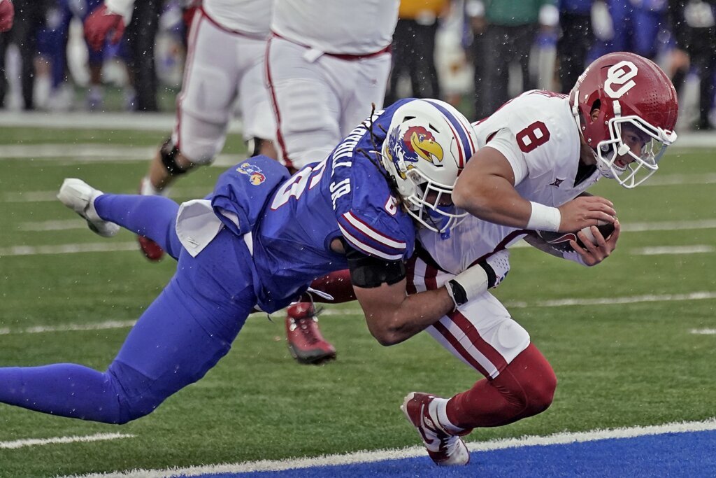 Neal scores go-ahead TD with 55 seconds left, KU holds on to beat No. 6 Oklahoma 38-33