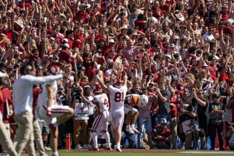 No. 1 Georgia romps 45-3 over Ball State behind Mews' punt return TD, 3  interceptions