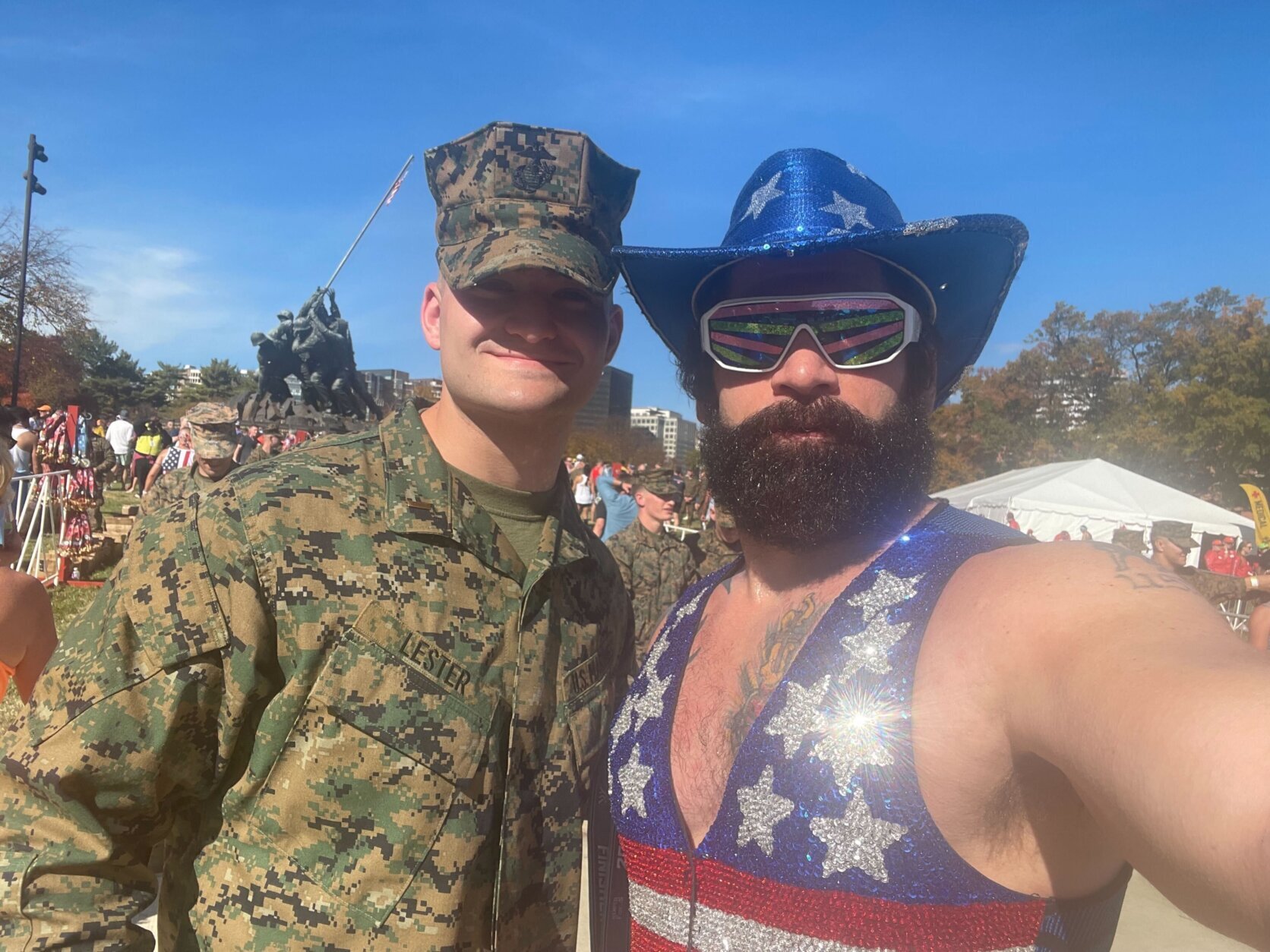 Phil Pinti poses with a military member