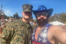 Phil Pinti poses with a military member