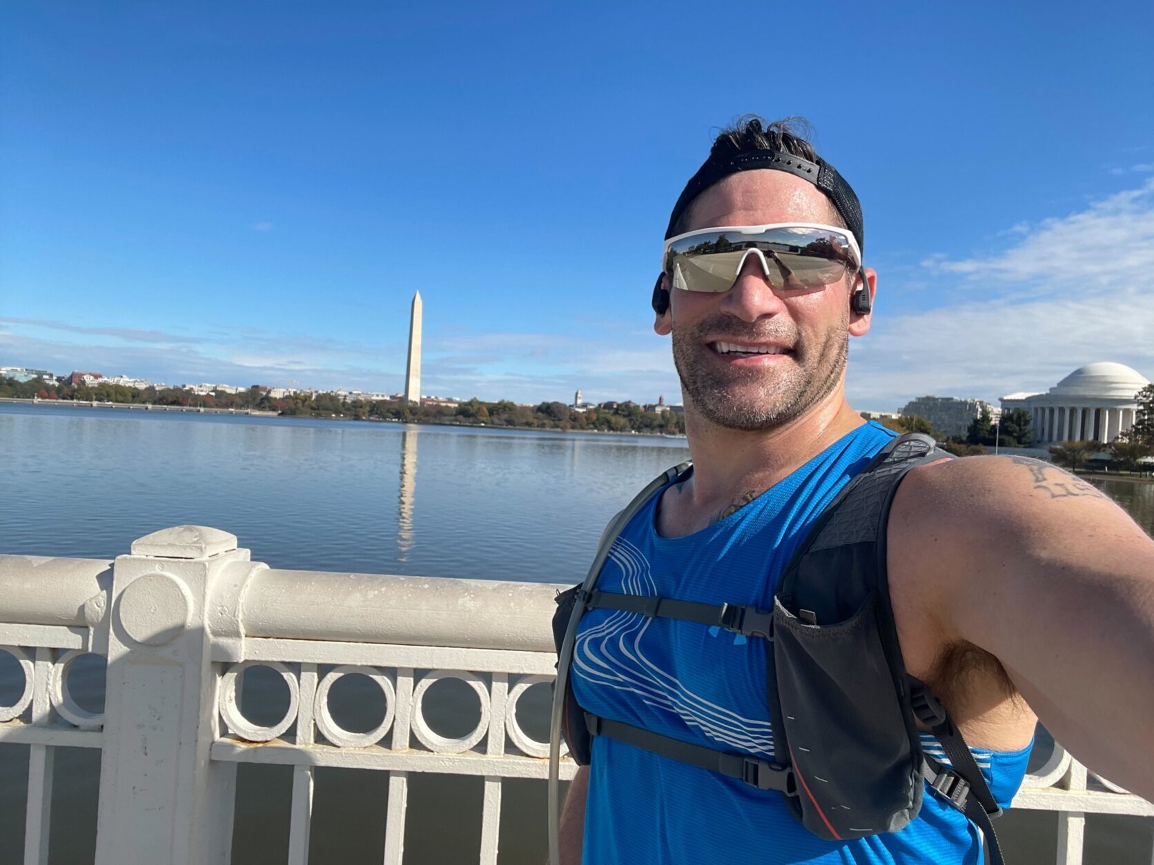 Phil Pinti running with Washington Monument in the background