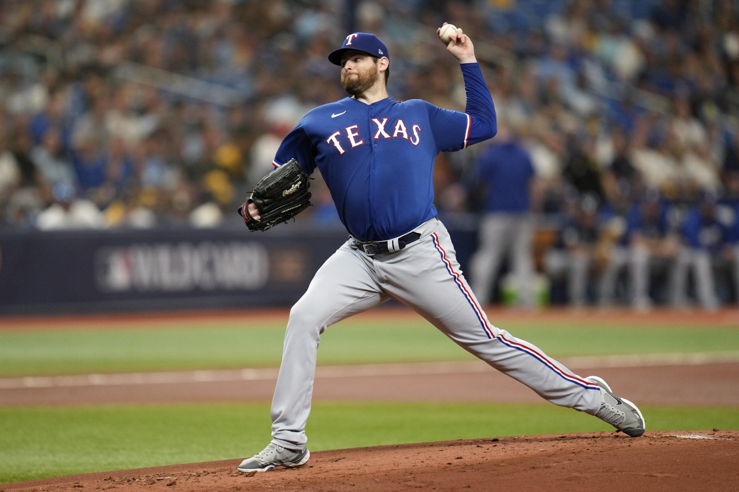 Montgomery sparkles, Rangers beat sloppy Rays 4-0 in AL Wild Card