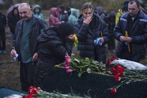 Days after deadly missile strike on Ukrainian cafe, grief and a search for answers