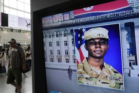 Army private who fled to North Korea charged with desertion, held by US military, officials tell AP
