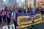 DC-area office building custodians call for better wages with march through DC