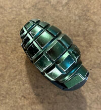 This replica hand grenade was removed from a carry-on bag at Frederick Douglass Greater Rochester International Airport. (Courtesy TSA)