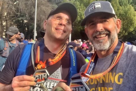 ‘Team sport’: A blind, deaf veteran and his guide set to conquer Marine Corps Marathon