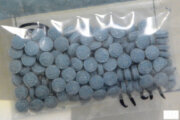 This undated photo made available by the U.S. Drug Enforcement Administration shows heroin fentanyl pills. (DEA via AP)