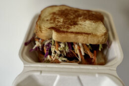 The breaded chicken sandwich comes on toasted bread with pickles, coleslaw and a special sauce. (WTOP/Nick Iannelli)