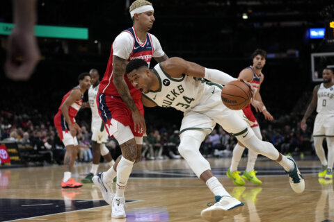 Antetokounmpo scores 42 on 20-of-23 shooting, leading the Bucks to a 142-129 win over the Wizards