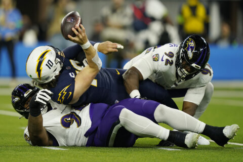 Baltimore’s Madubuike trying for a record 11th straight game with at least a half-sack