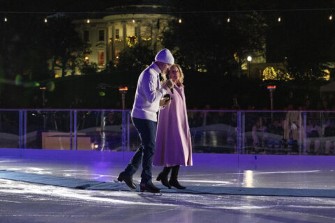 Jill Biden brings a holiday ice rink to the White House for children to skate and play hockey