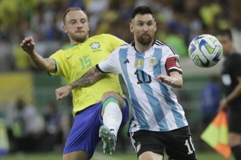 Messi's Argentina beats Brazil in a World Cup qualifying game delayed by crowd violence