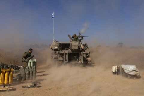Fighting Hamas deep in Gaza City, Israel foresees control of the enclave’s security after the war