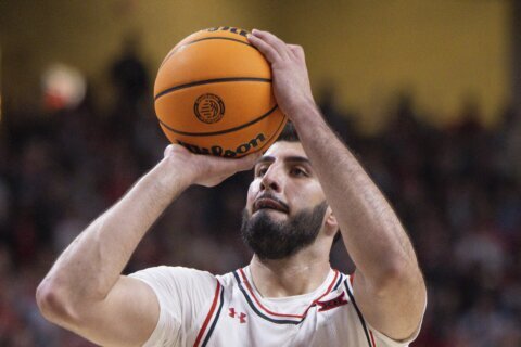 Cal coach says son of Afghan refugee Fardaws Aimaq was called 'a terrorist' by a heckling fan