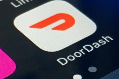 DoorDash orders surge 24% in the third quarter, helping to narrow the delivery app’s losses