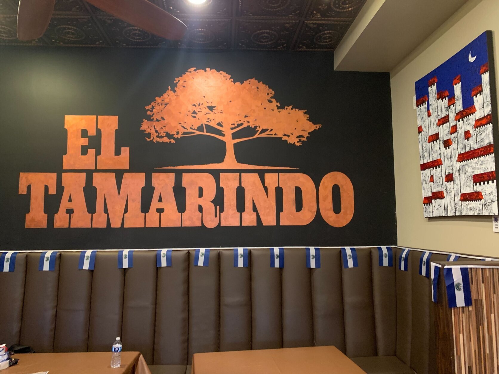 a wall that says El Tamarindo inside the restaurant