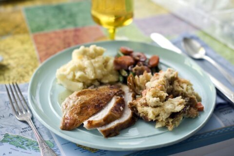 Turkey rules the table. But an AP-NORC poll finds disagreement over other Thanksgiving classics