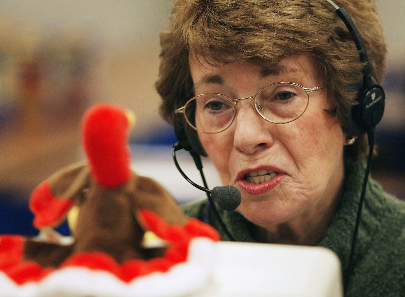 DOWNERS GROVE, IL - NOVEMBER 24: 14-year-veteran Butterball Turkey Talk-Line home economist June Rollins answers questions on her telephone headset at the Butterball Turkey Talk-Line headquarters November 24, 2003 in Downers Grove, Illinois. The Butterball Talk-Line was created to assist everyone from first-time cooks to seasoned chefs with preparing their holiday bird. Originally staffed with six home economists who responded to 11,000 phone calls in its first year alone, today the Talk-Line is staffed with nearly 50 home economists and nutritionists who respond to more than 100,000 questions each November and December. ConAgra Foods opened the Butterball Turkey Talk-Line in 1981. (Photo by Tim Boyle/Getty Images)