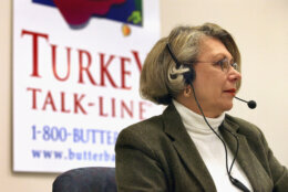 DOWNERS GROVE, IL - NOVEMBER 24: 19-year-veteran Butterball Turkey Talk-Line supervisor Dorothy Jones answers questions on her telephone headset at the Butterball Turkey Talk-Line headquarters November 24, 2003 in Downers Grove, Illinois. The Butterball Talk-Line was created to assist everyone from first-time cooks to seasoned chefs with preparing their holiday bird. Originally staffed with six home economists who responded to 11,000 phone calls in its first year alone, today the Talk-Line is staffed with nearly 50 home economists and nutritionists who respond to more than 100,000 questions each November and December. ConAgra Foods opened the Butterball Turkey Talk-Line in 1981. (Photo by Tim Boyle/Getty Images)