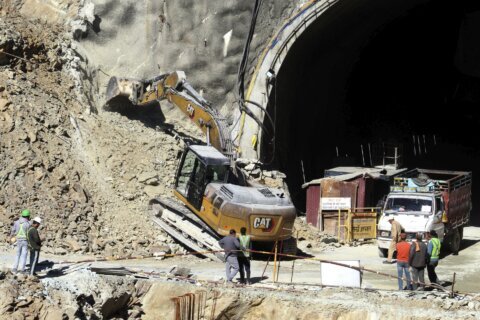 41 workers in India are stuck in a tunnel for an 8th day. Officials consider alternate rescue plans